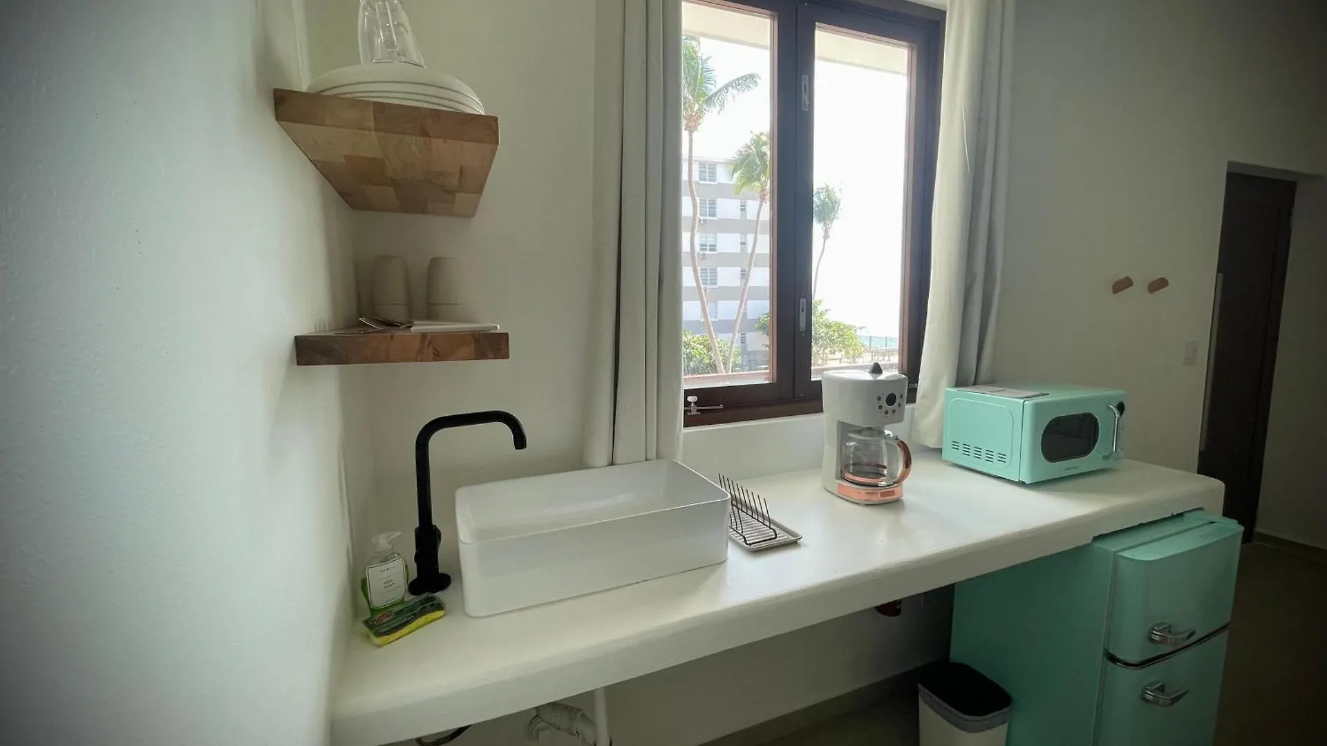 1 Corcega Beachfront Suites رينكون